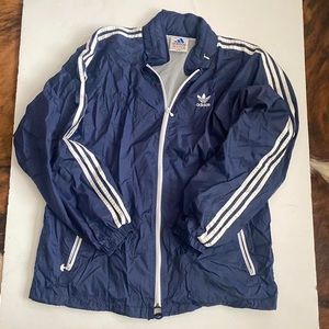 Vintage adidas windbreaker - blue white 
Packable hood in the collar XL